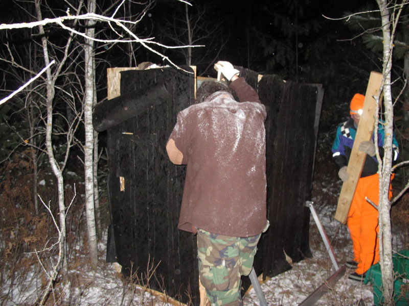 Jason Sawyer (inside), Ted Parvu (back to camera), Jim Stroner (right) assemble a den shed - Nov 20, 2011