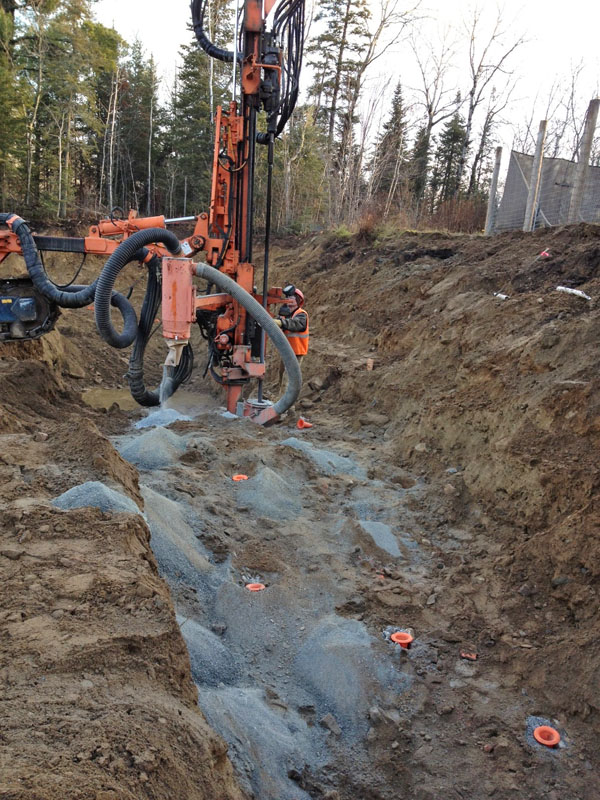 Orange cones keep blast holes open as drilling continues - Nov 8, 2012