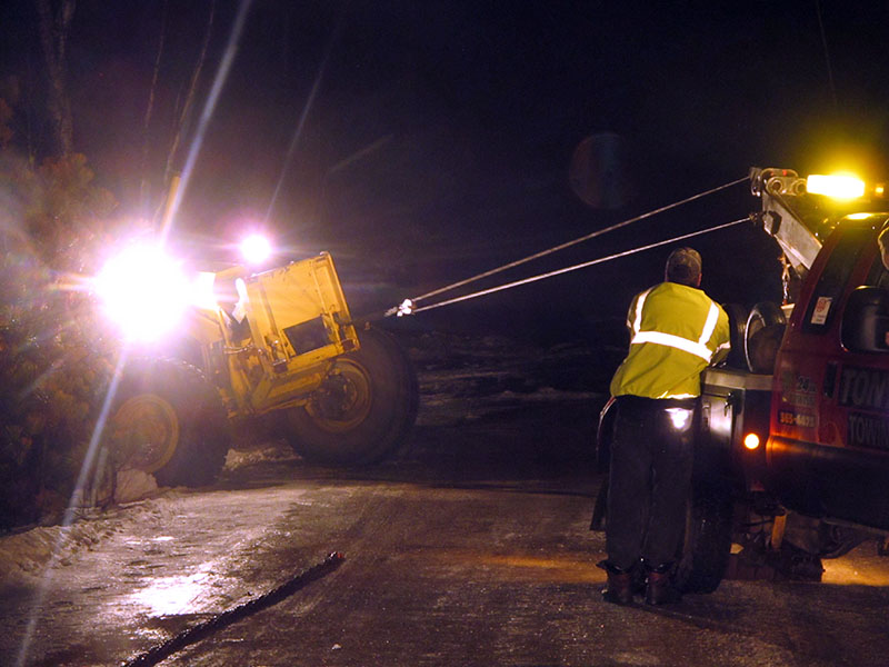 Pulling grader back onto road - Jan 11, 2013