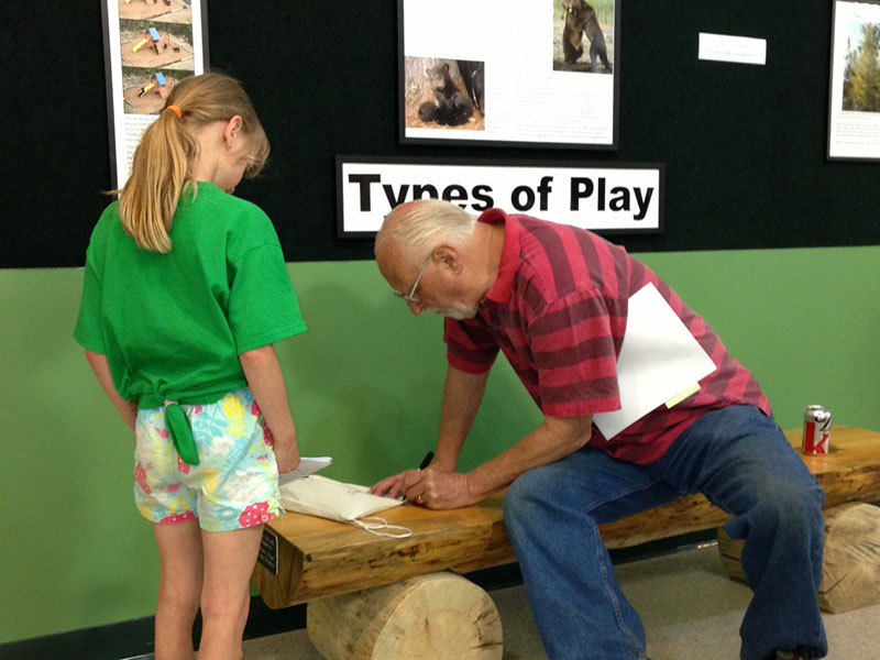 Lynn signs camper's backpack