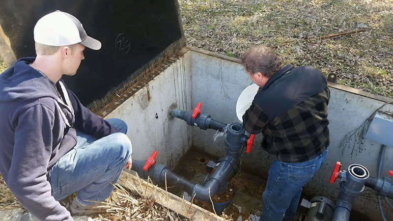 Scott working on waterfall pump