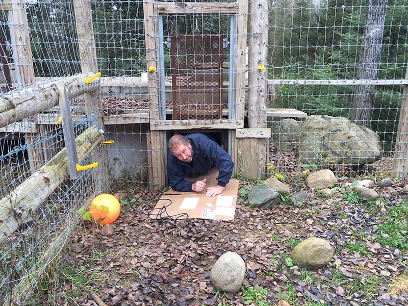 Scott coming out of den